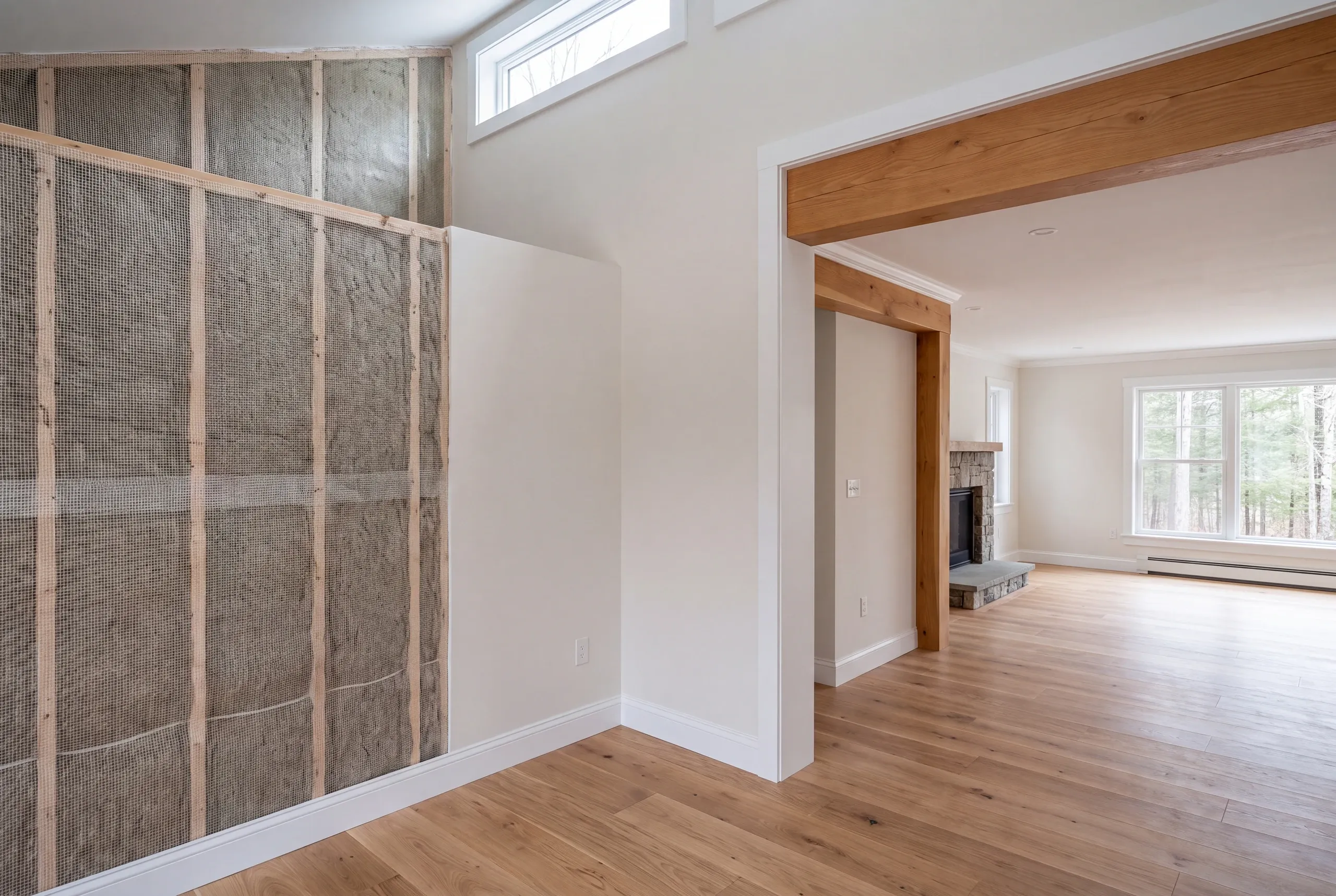 Dense-pack insulation going into a Vienna, Maine wall cavity