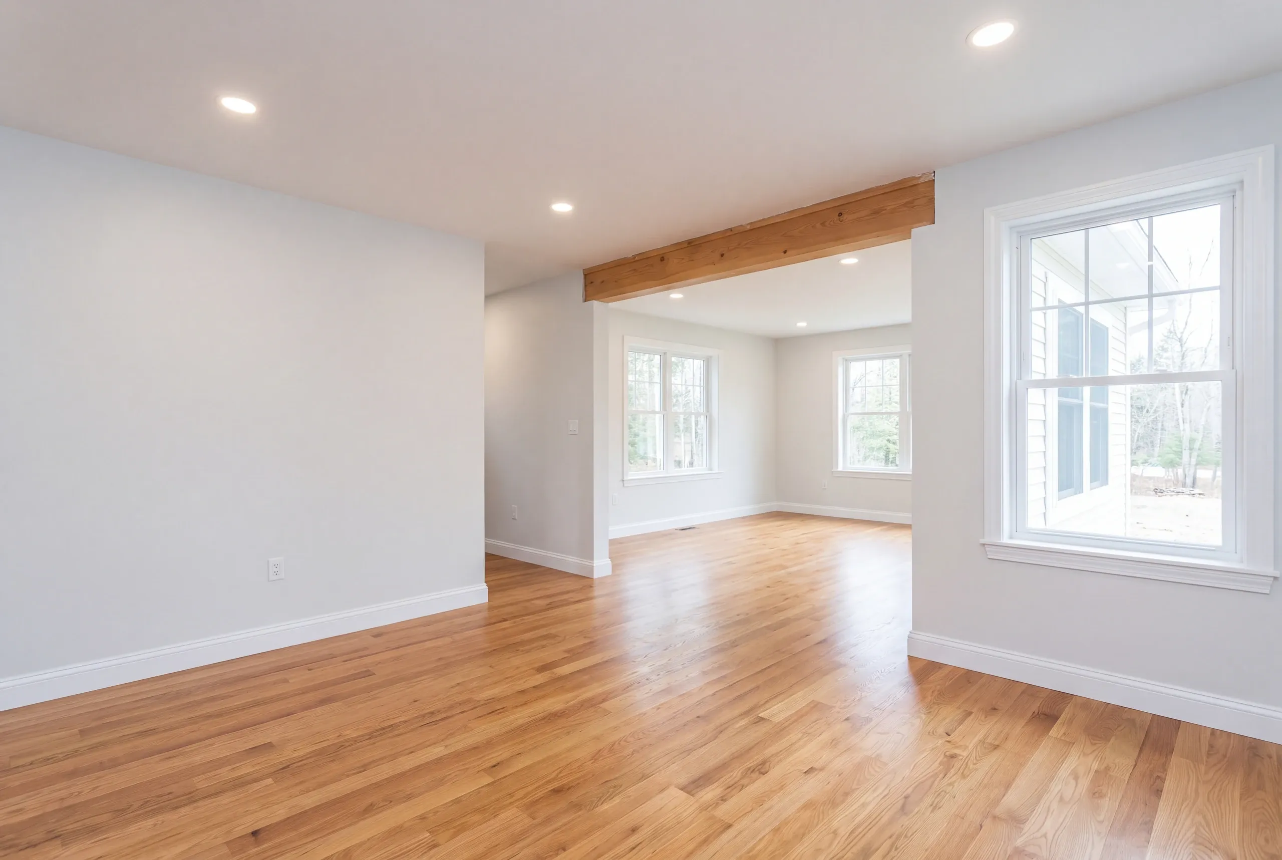 Finished renovated living space in a Vienna, Maine home, wide interior view