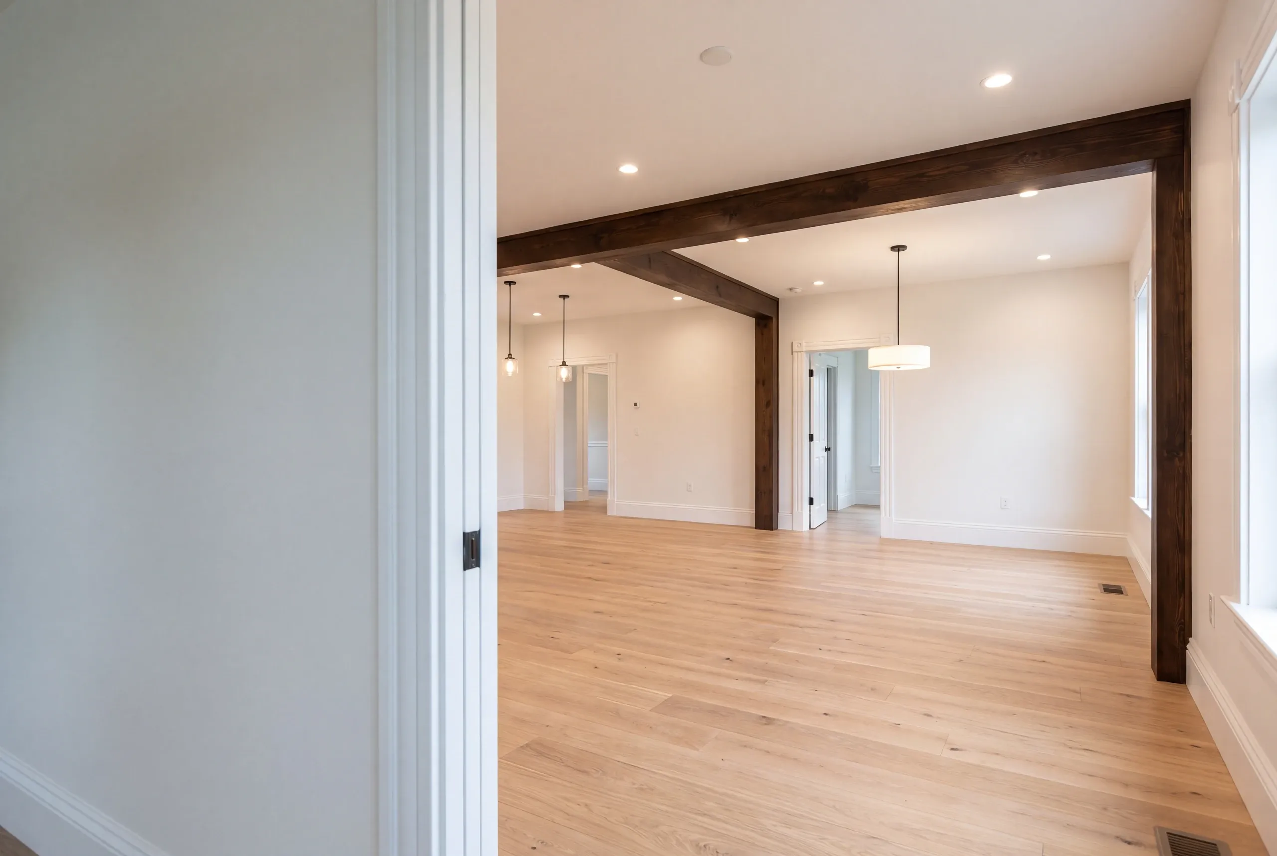 Finished renovated living space in a Waterville, Maine home, wide interior view