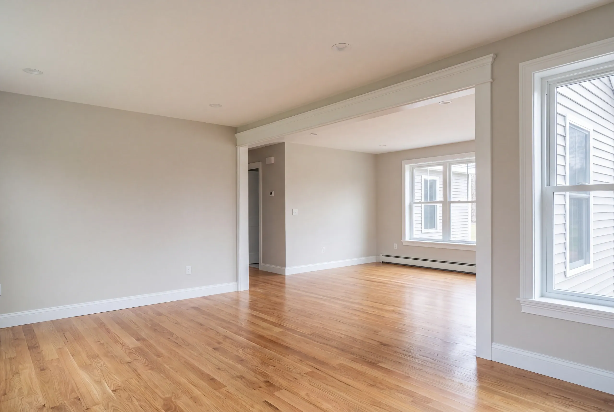 Finished renovated living space in a Winslow, Maine home, wide interior view