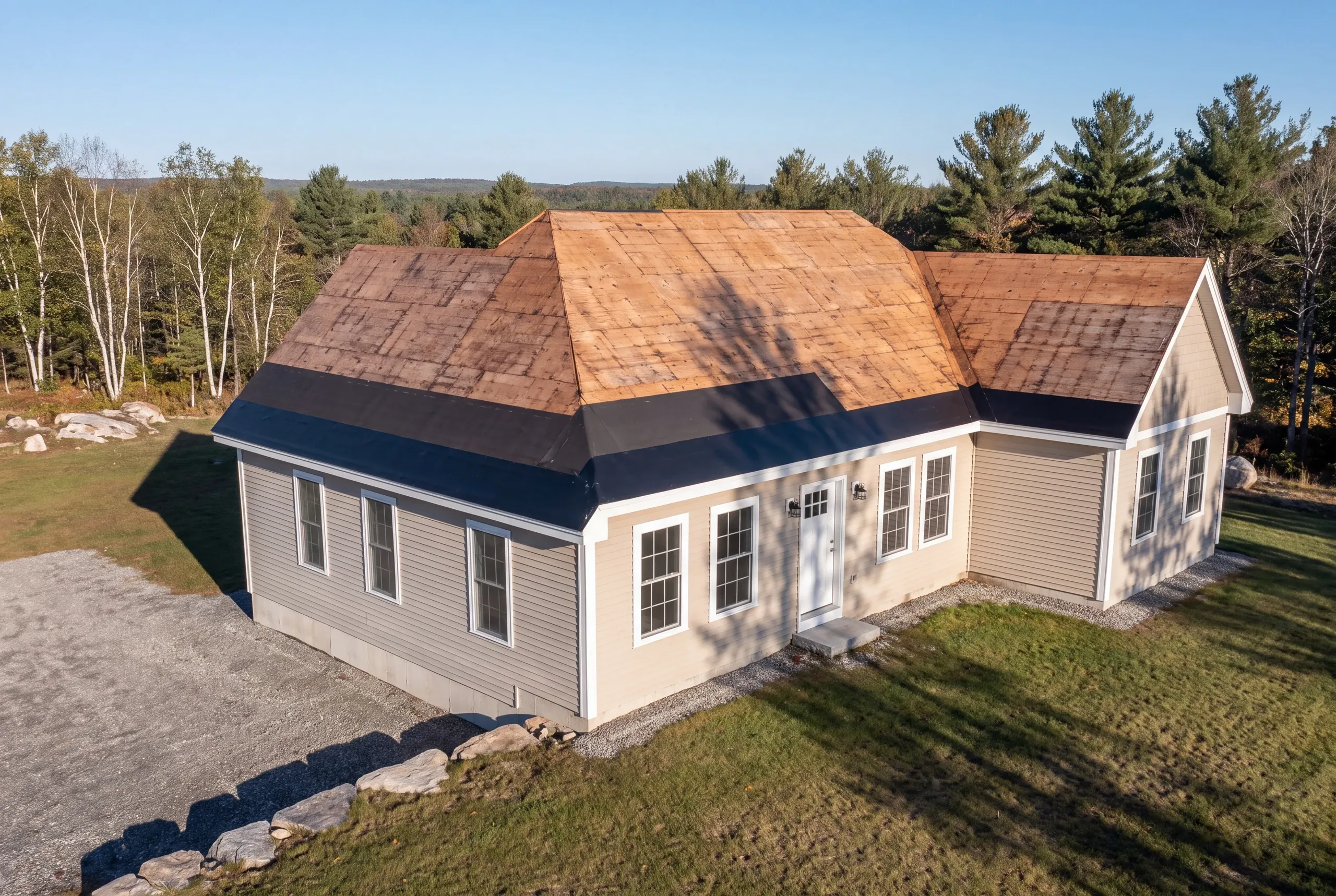 Architectural asphalt shingles being installed on an Augusta gable roof