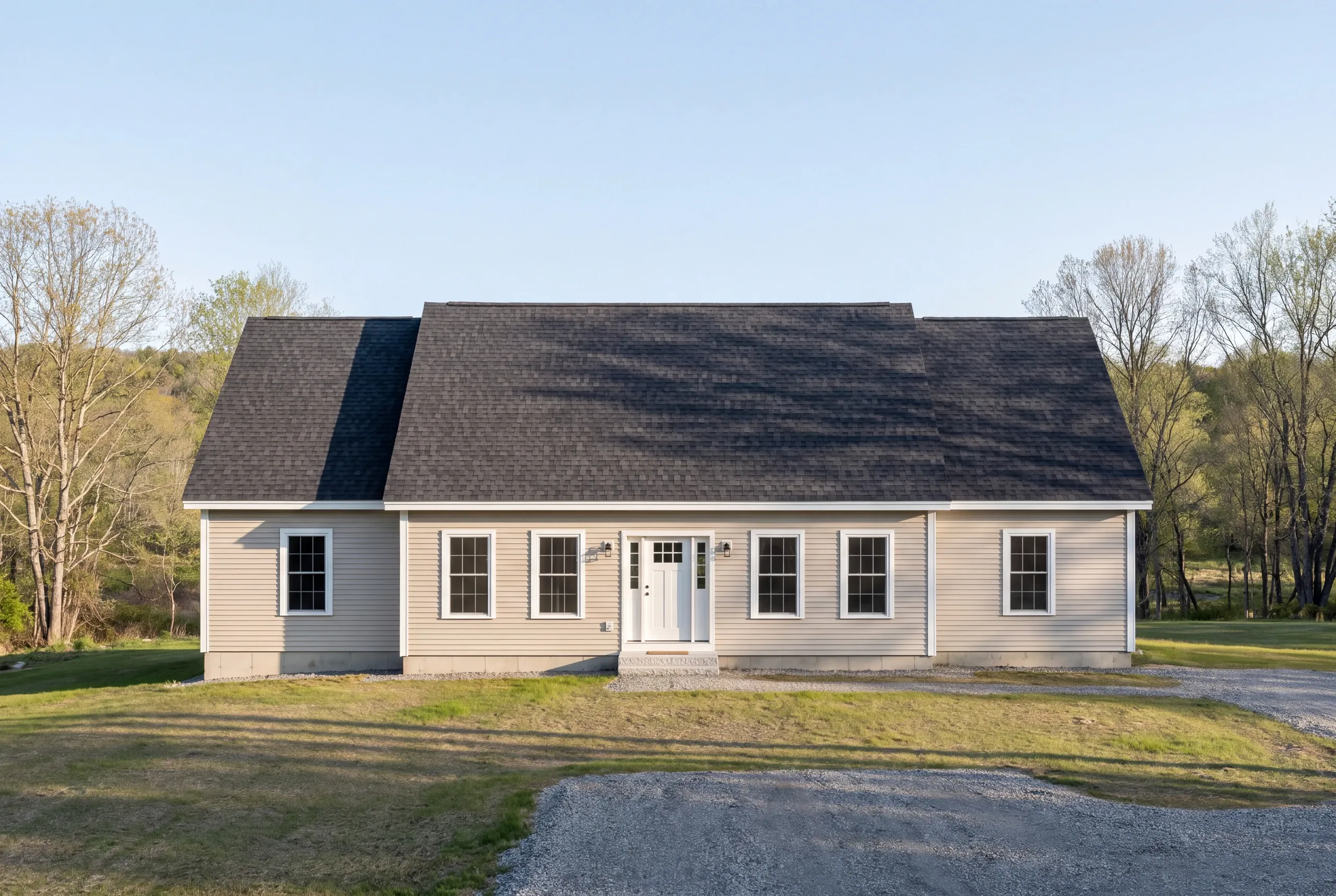 Finished architectural shingle roof on a Farmington, Maine home, wide view