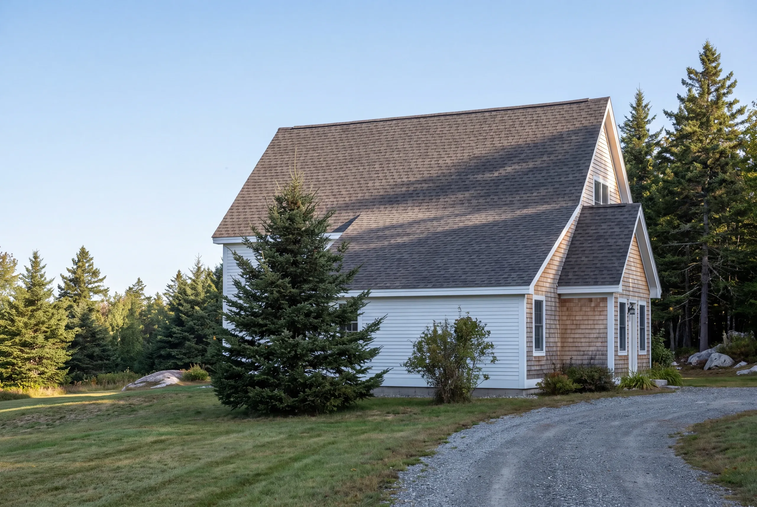 Finished architectural shingle roof on a Vienna, Maine home, wide view