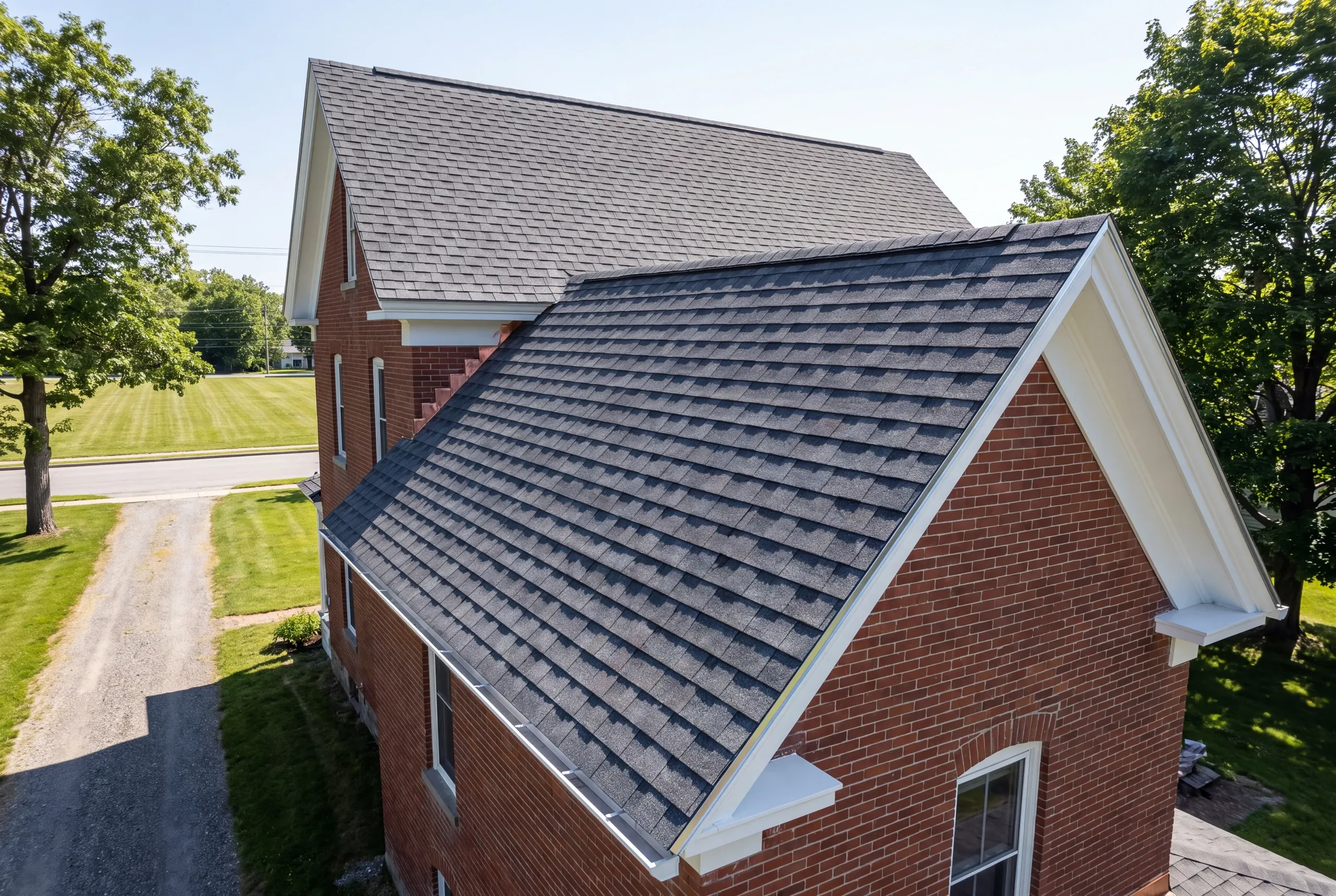 Finished architectural shingle roof on a Waterville, Maine home, wide view